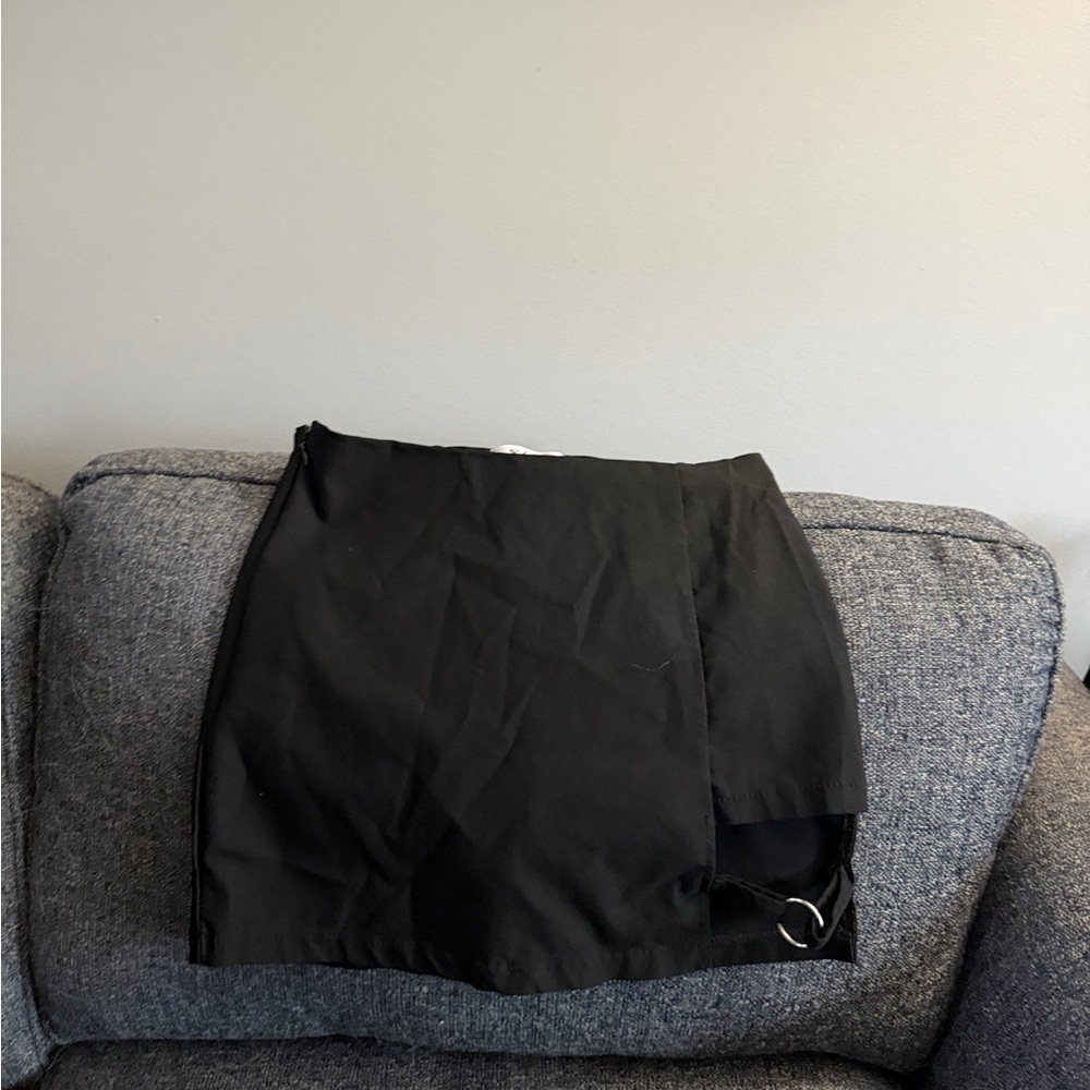 Elegant Black Mini Skirt with Metal Accent